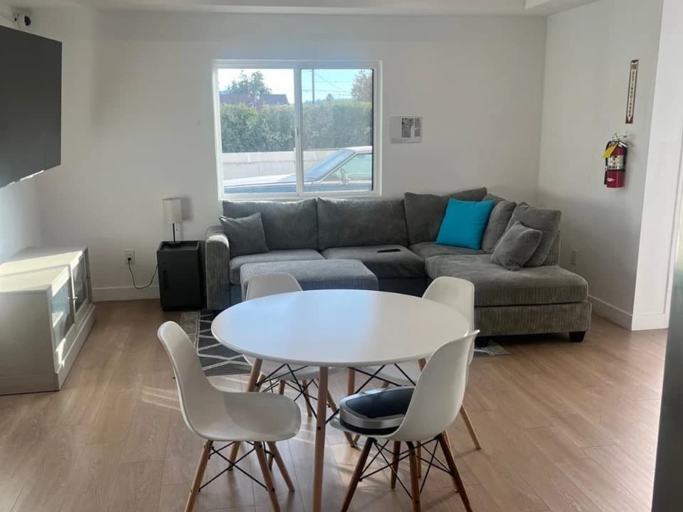 Comfortable living and dining area at a California treatment home